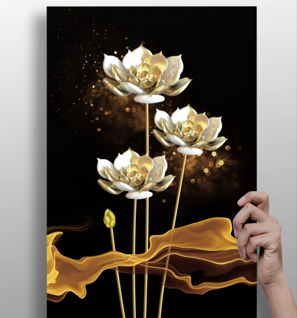 Decorative wall art with gold and white lotus flowers on a dark background